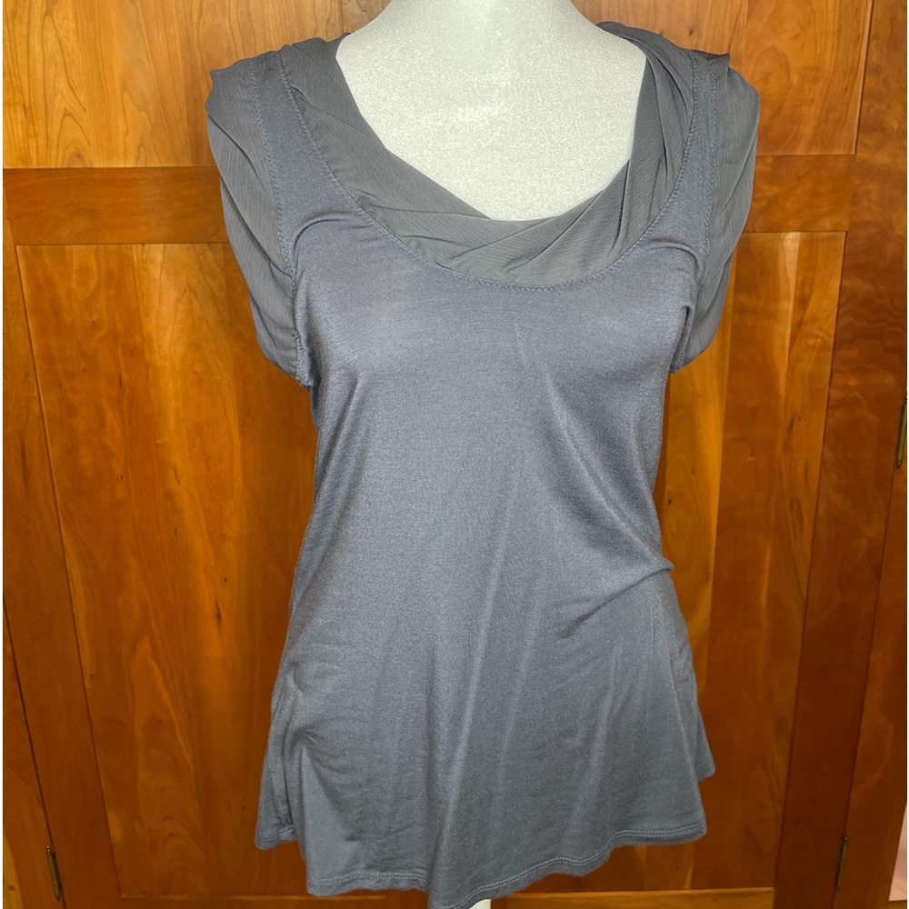 Grey BCBG U neck blouse with pretty detailing.